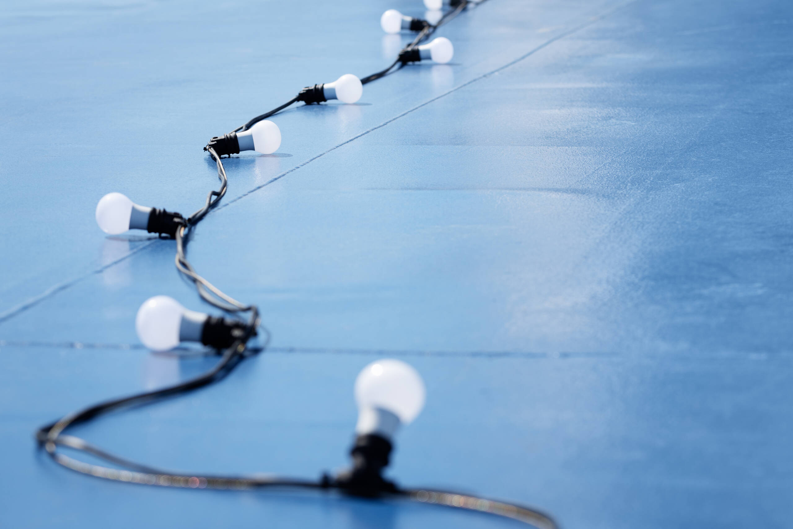 Abstract blue background with electrical elements